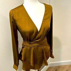 Silk wrap top from anthropologie. Like new. Perfect condition.